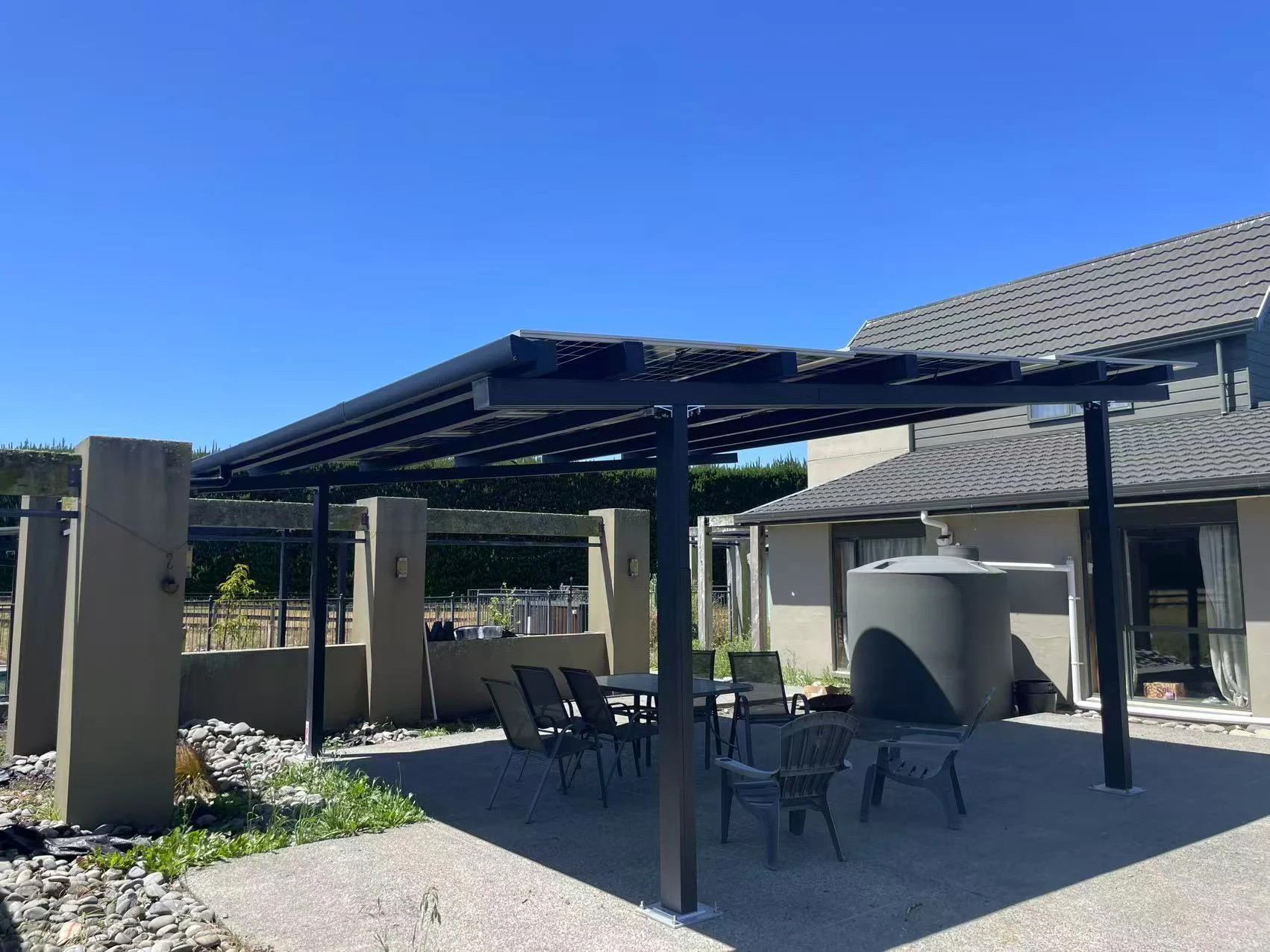 Solar canopy above the courtyard seating area.
