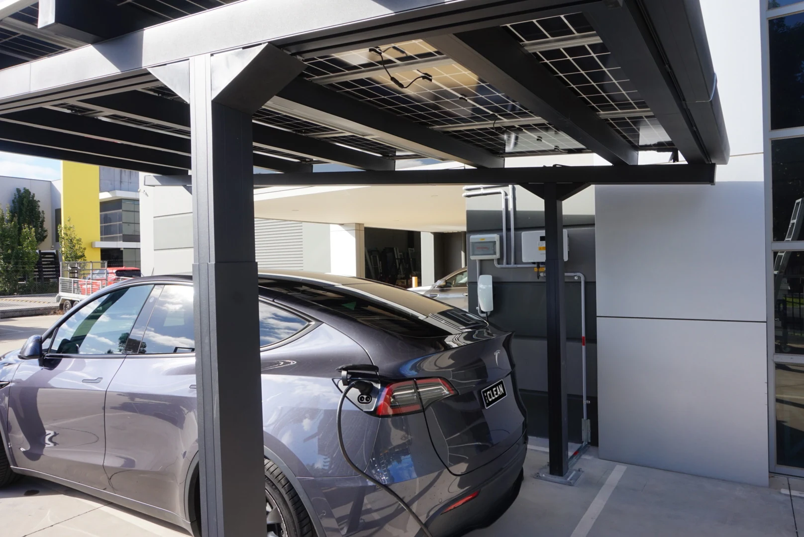 Panel underside, supporting frame and wall-mounted charging equipment.