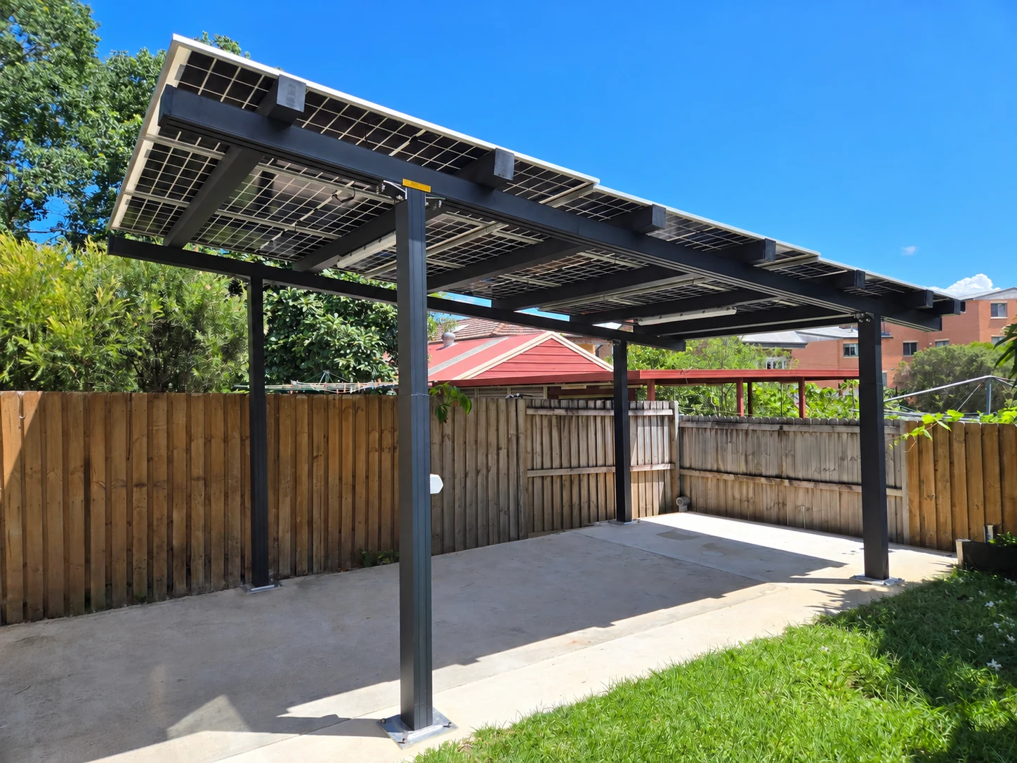 The completed carport and covered parking area.